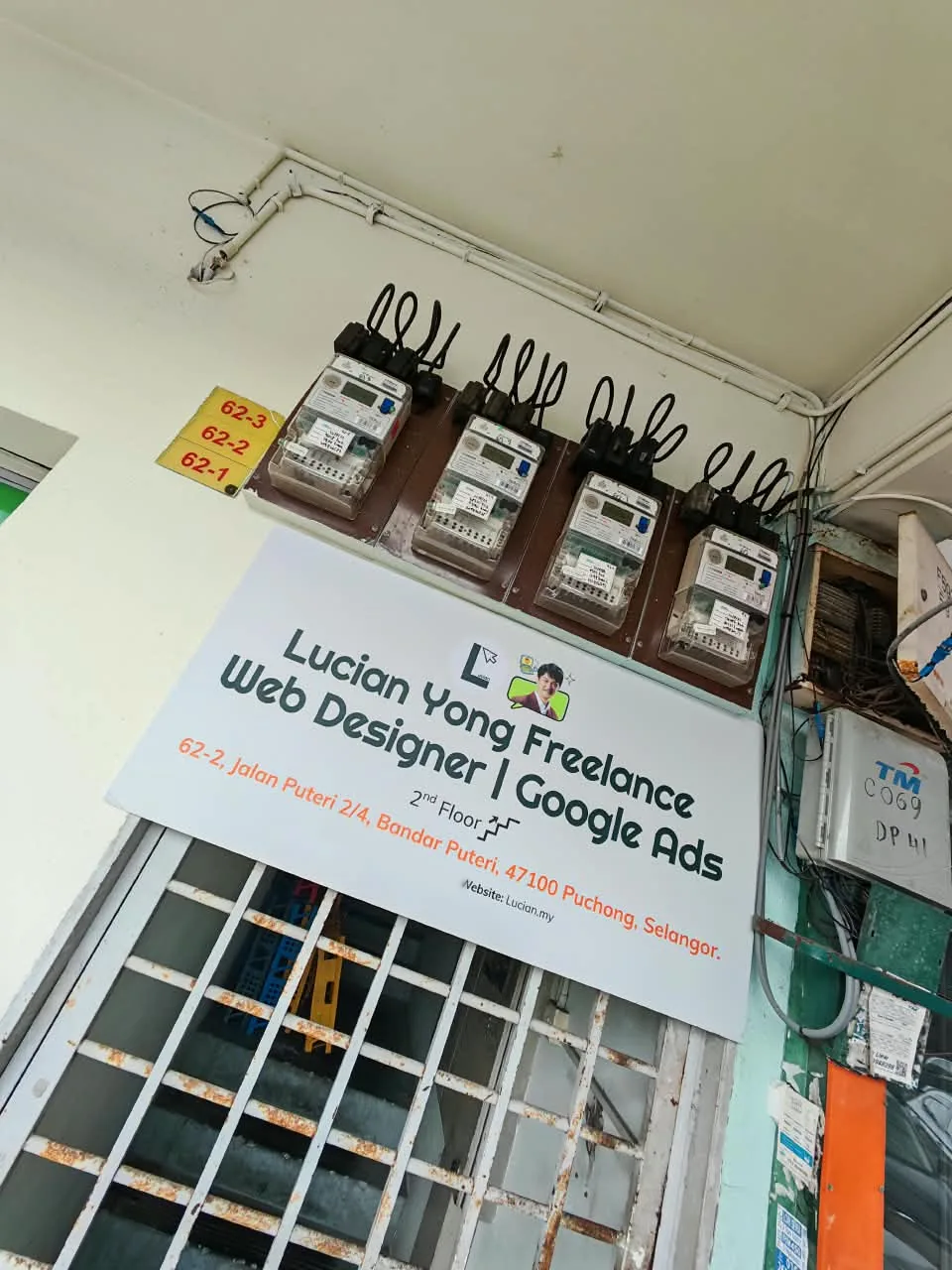Lucian Yong signboard above the stair gate at 62-2, Jalan Puteri 2/4, Bandar Puteri, Puchong